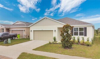 1838 Blue Lagoon Cir in Mascotte, FL - Building Photo