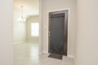 7426 Flintrock Hollow Trail, Unit 07E in Richmond, TX - Building Photo - Building Photo