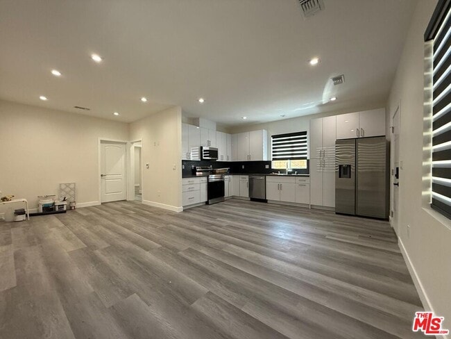 property at 10229 1/2 Jumilla Ave