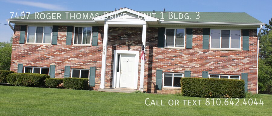 7407 Roger Thomas Dr in Mount Morris, MI - Building Photo