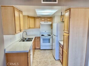 51080 Eisenhower Dr in La Quinta, CA - Building Photo - Building Photo