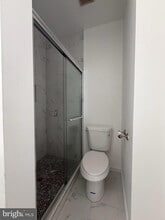 7704 Periwinkle Way, Unit 332 in Severn, MD - Foto de edificio - Building Photo