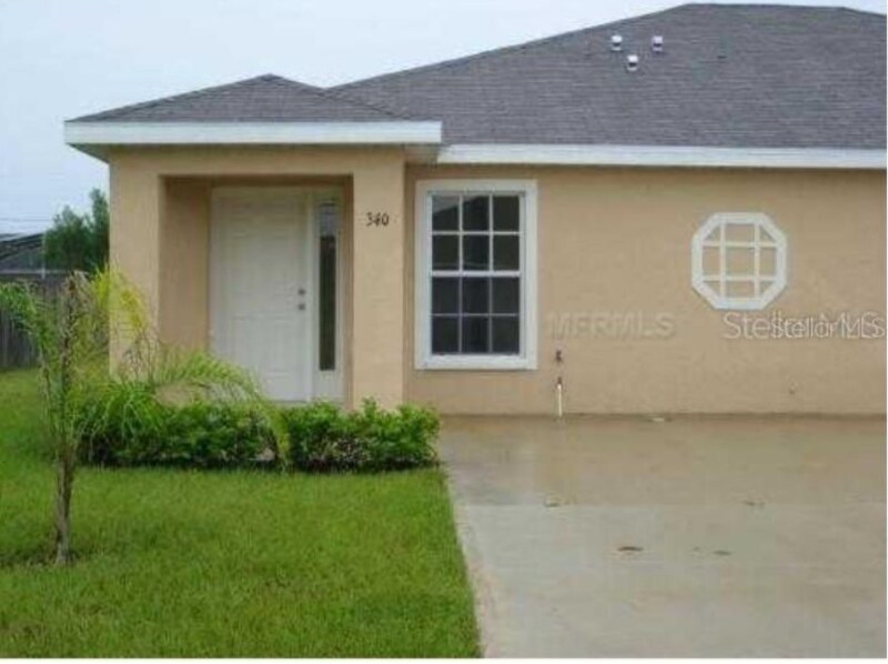 340 Greenwich Ct-Unit -340 in Poinciana, FL - Building Photo