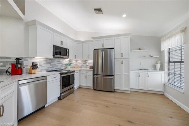 13040 Castle Harbour Dr in Naples, FL - Building Photo - Building Photo