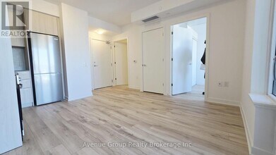 7437 Kingston Rd in Toronto, ON - Building Photo - Building Photo