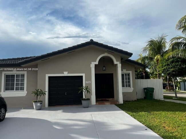 property at 13941 SW 13th St