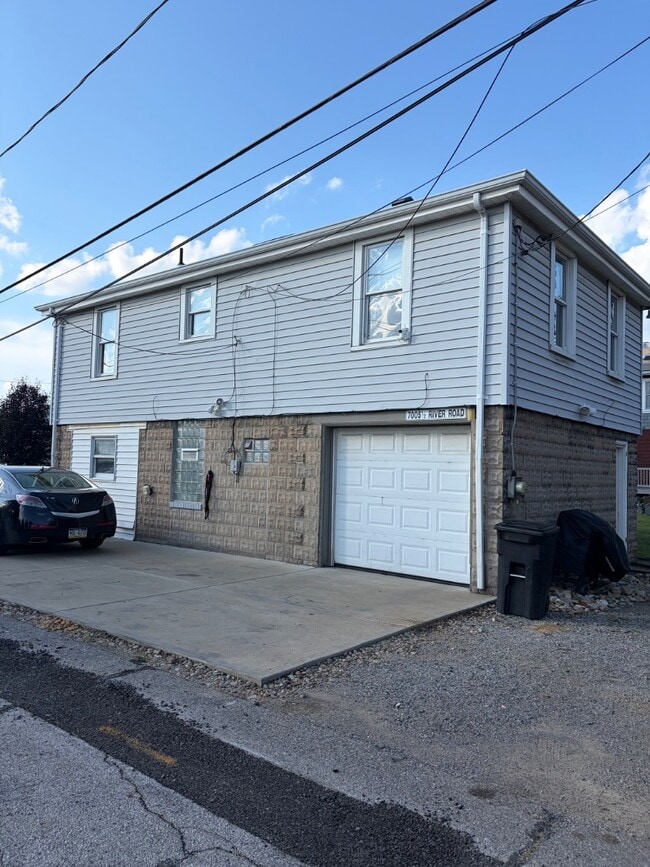 property at 7005 1/2 Front River Rd