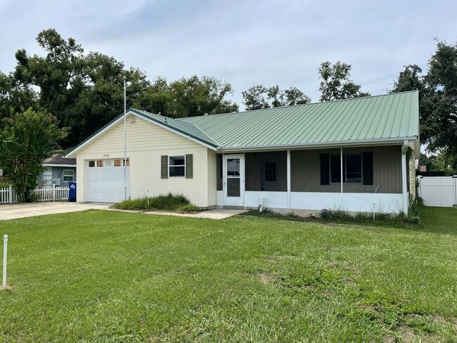 property at 709 N Rockingham Ave