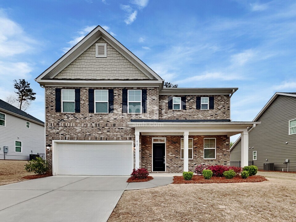 417 Tributary Ln in Holly Springs, GA - Building Photo
