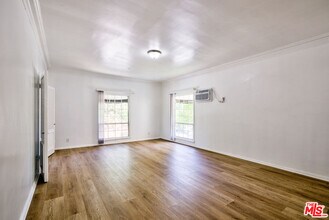 203 S Doheny Dr in Beverly Hills, CA - Building Photo - Building Photo