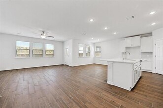 806 Pepperbark Loop in Mustang Ridge, TX - Building Photo - Building Photo