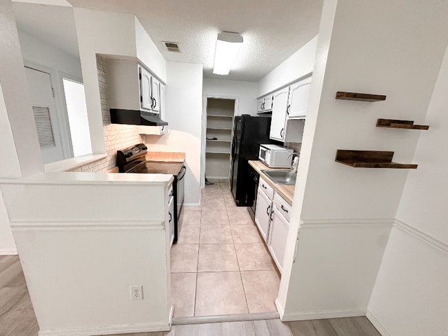 6040 Grelot Rd in Mobile, AL - Foto de edificio - Building Photo