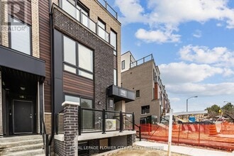 155 Tapscott Rd in Toronto, ON - Building Photo - Building Photo