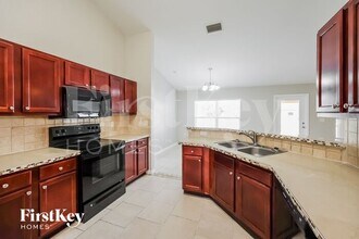 414 Willowbrook Dr in Lehigh Acres, FL - Building Photo - Building Photo