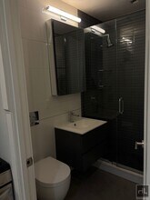 Stanton Street, Unit 5E1 in New York, NY - Building Photo - Building Photo