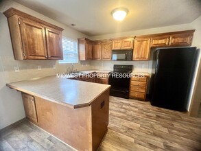 1021 Kaycee Dr in Raymore, MO - Building Photo - Building Photo