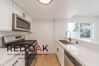 13910 Sayre St, Unit 25 in Los Angeles, CA - Building Photo - Building Photo