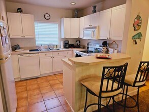 180 Portside Ave, Unit 102 in Cape Canaveral, FL - Foto de edificio - Building Photo