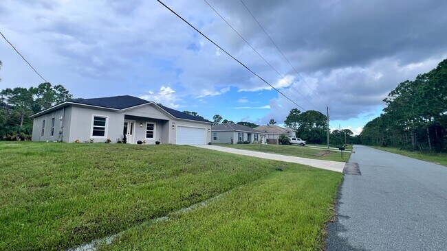 1006 Westunder St SE in Palm Bay, FL - Building Photo - Building Photo
