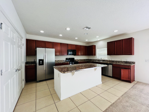 4968 Whistling Wind Ave in Kissimmee, FL - Foto de edificio - Building Photo
