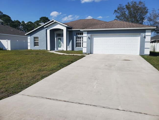 1431 SW Hackensack Ave in Port St. Lucie, FL - Building Photo - Building Photo