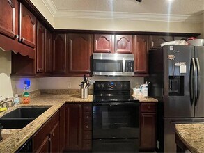 9481 Highland Oak Dr, Unit 1404 in Tampa, FL - Foto de edificio - Building Photo