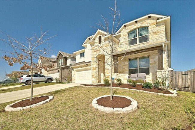 303 Cherrystone Loop in Mustang Ridge, TX - Building Photo - Building Photo