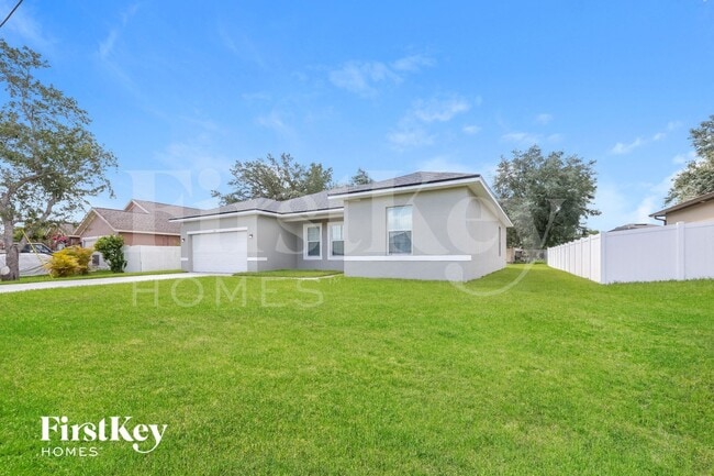 445 Eagle Dr in Poinciana, FL - Foto de edificio - Building Photo