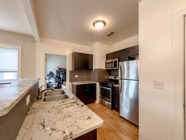 5610 N Western Ave, Unit A03K in Chicago, IL - Building Photo - Building Photo
