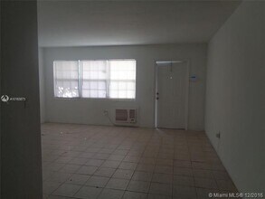 1451 NE 170th St, Unit 104A in North Miami Beach, FL - Building Photo - Building Photo