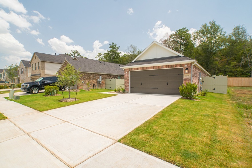 10696 Wild Chives, Unit A_519 in The Woodlands, TX - Building Photo