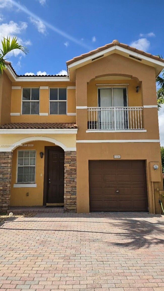 property at 10201 NW 10th St
