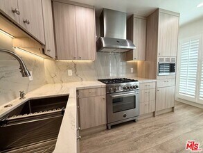 9595 W Olympic Blvd in Beverly Hills, CA - Building Photo - Building Photo