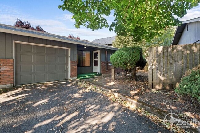 property at 3103 NE Whitman Ave