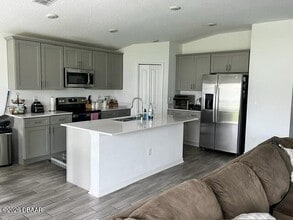 1100 Sand Trap Ct in Daytona Beach, FL - Building Photo - Building Photo