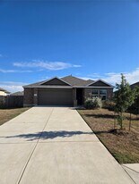215 Silver Springs Bend in Niederwald, TX - Building Photo
