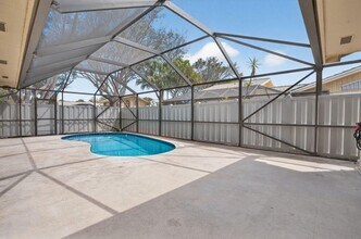 5230 Woodruff Ln in Palm Beach Gardens, FL - Building Photo - Building Photo