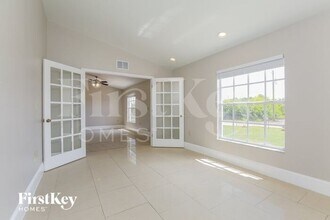 1111 Adeline Ave in Lehigh Acres, FL - Building Photo - Building Photo