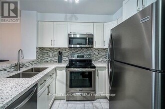2177-2177 Burnhamthorpe Rd W in Mississauga, ON - Building Photo - Building Photo