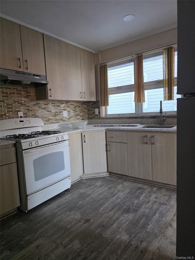 property at 13-03 154th St