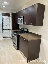 1418 N Poinsettia Pl in Los Angeles, CA - Building Photo - Building Photo