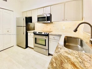 1103 Myrtlewood Cir E in Palm Beach Gardens, FL - Building Photo - Building Photo
