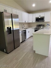 876 Apartment St in Lehigh Acres, FL - Building Photo - Building Photo