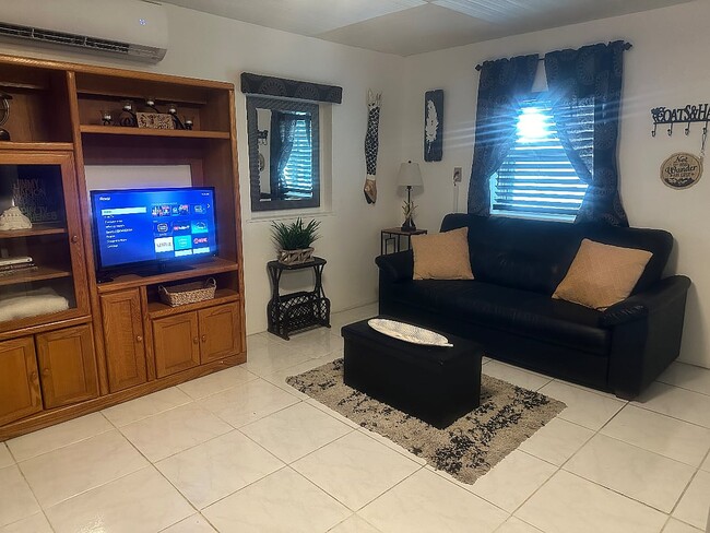 22526 Old Dixie Hwy, Unit Bougainvillea Cottage in Goulds, FL - Building Photo - Building Photo