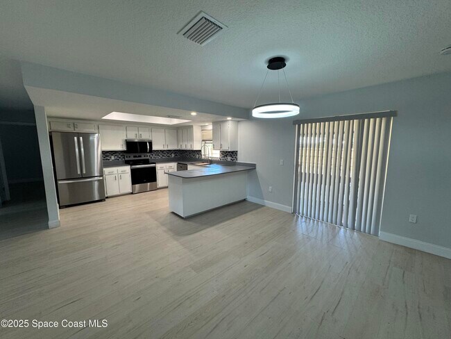 1320 Woodingham Dr in Rockledge, FL - Building Photo - Building Photo