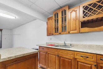 6980 NW 186th St, Unit 3-120 in Hialeah, FL - Building Photo - Building Photo