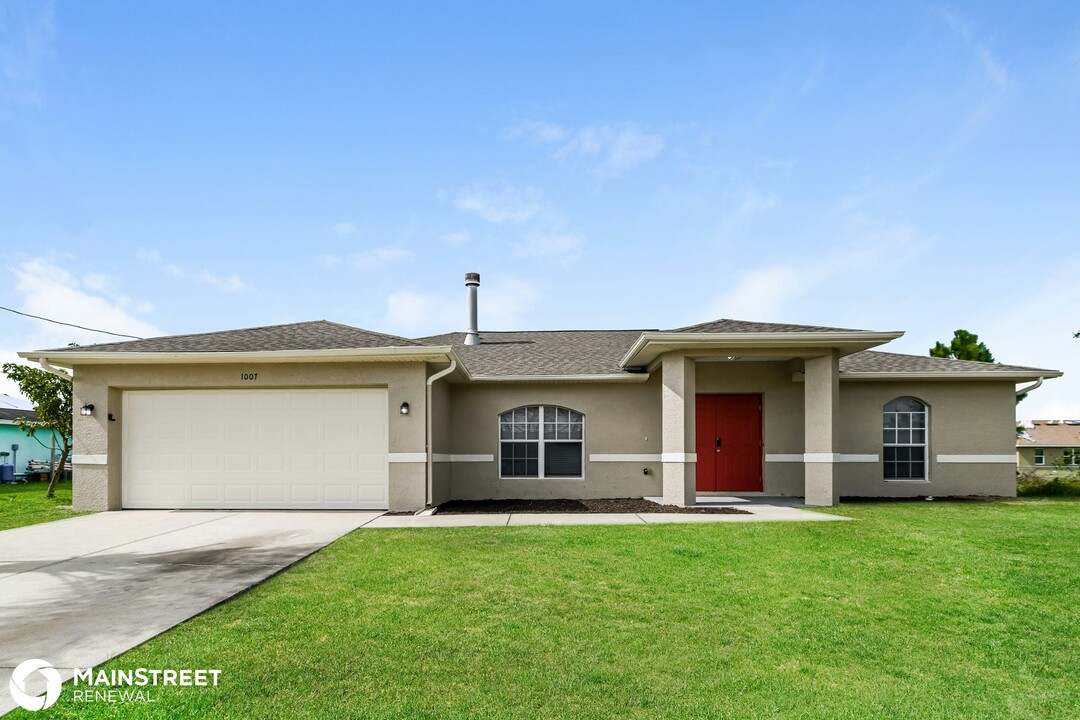 1007 Anson Ave-Unit -C032 in Lehigh Acres, FL - Building Photo