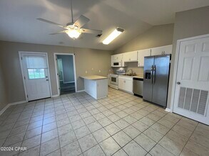 7102 N Lagoon Dr in Panama City, FL - Building Photo - Building Photo