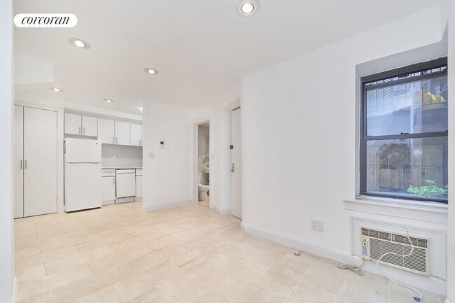 property at 233 E 12th St