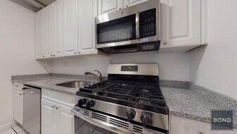 207-209-209 W 11th St in New York, NY - Building Photo